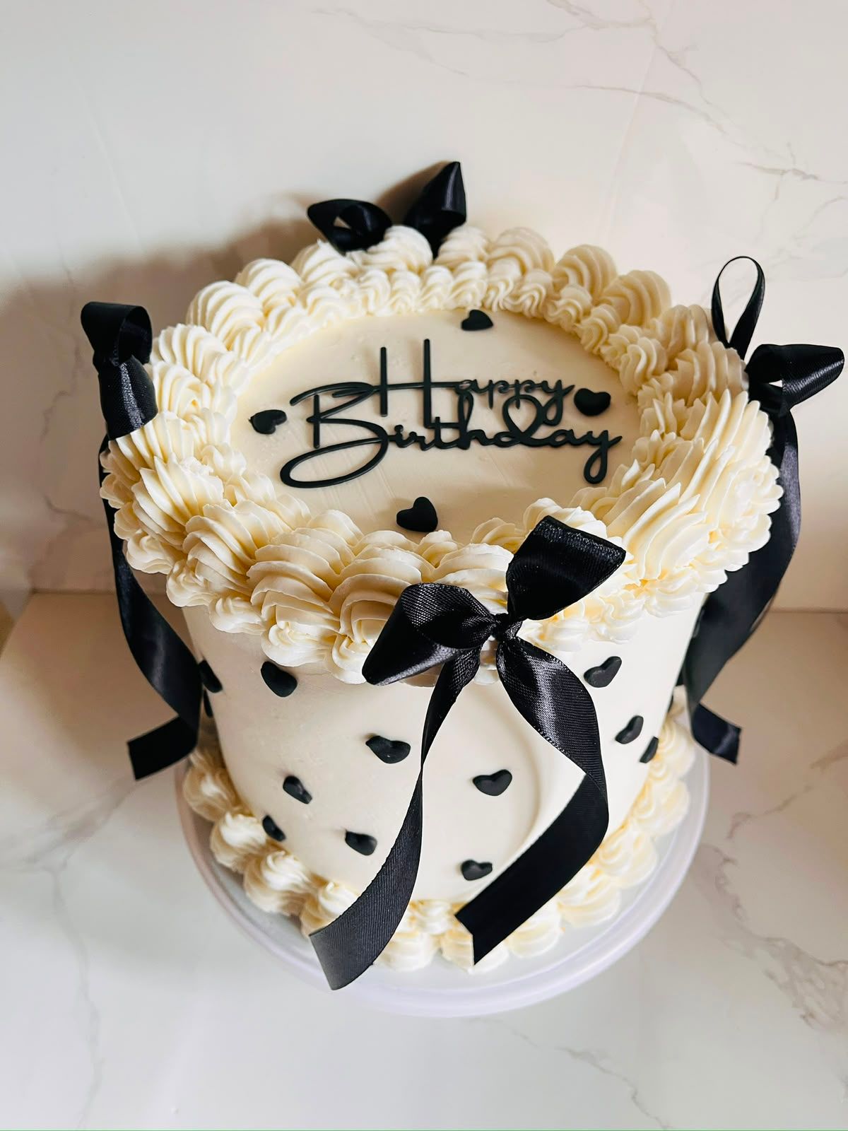 Black Bow Birthday Cake by Baked by Buhlebenkosi