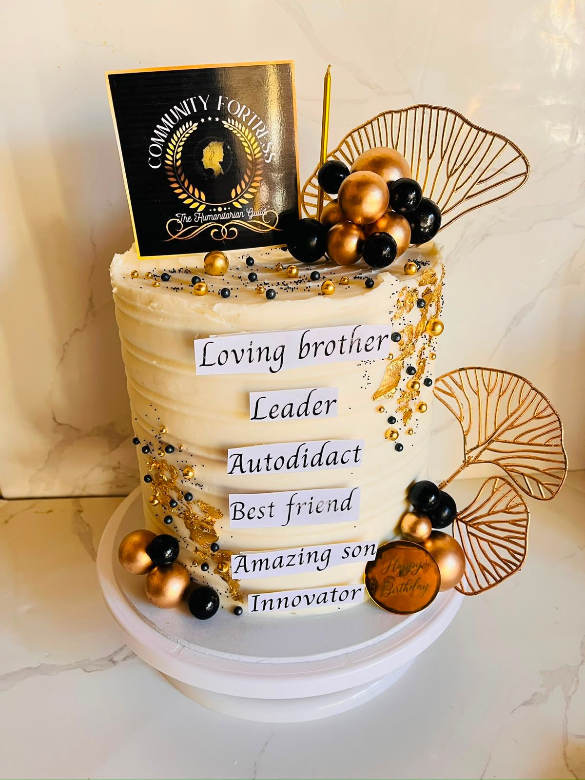 Black & Gold Tribute Cake by Baked by Buhlebenkosi