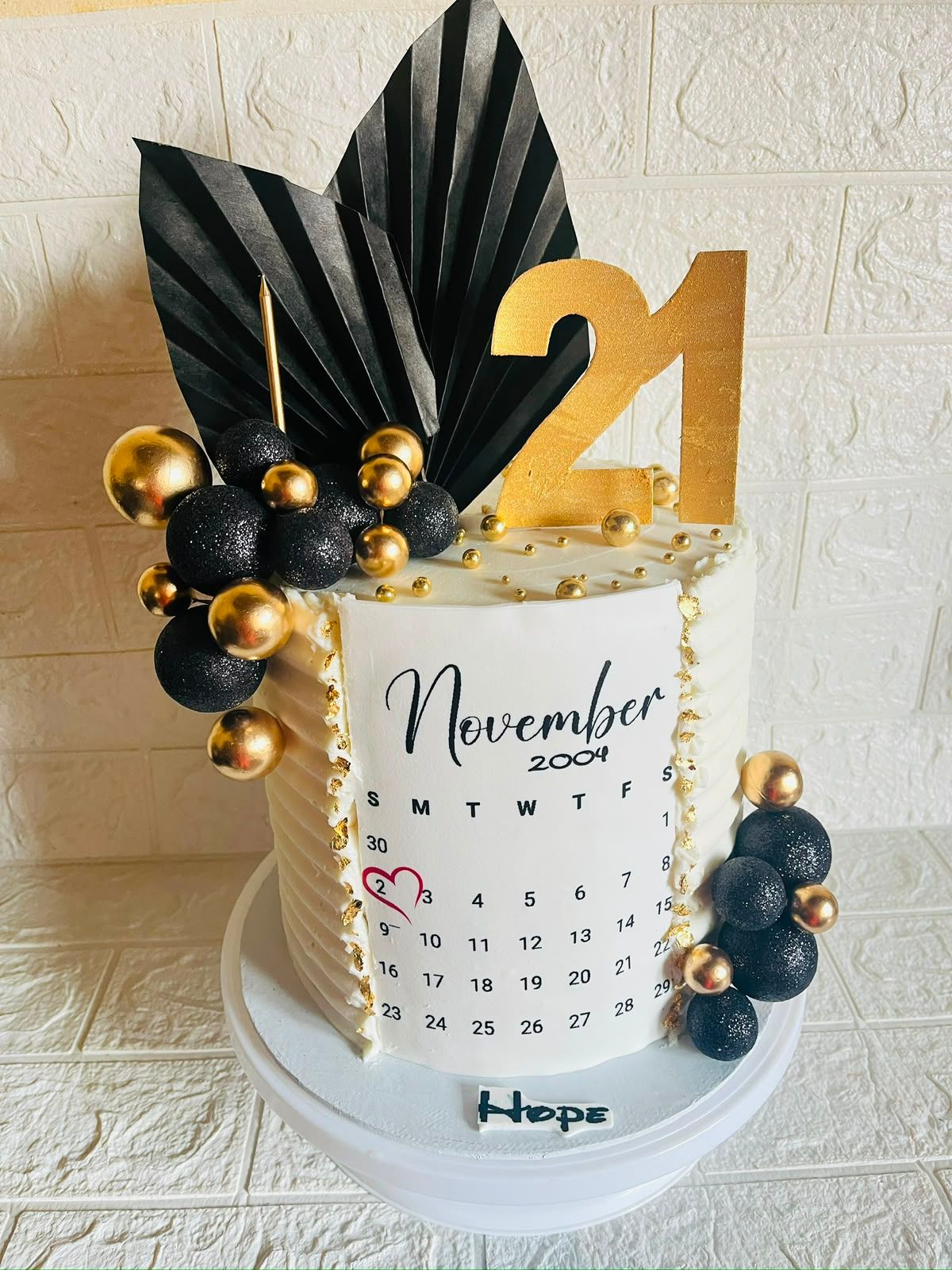 Black & Gold 21st Calendar Cake by Baked by Buhlebenkosi