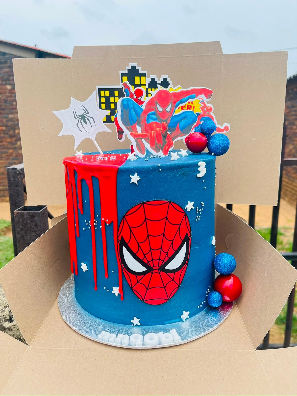 Spider-Man Drip Cake by Baked by Buhlebenkosi