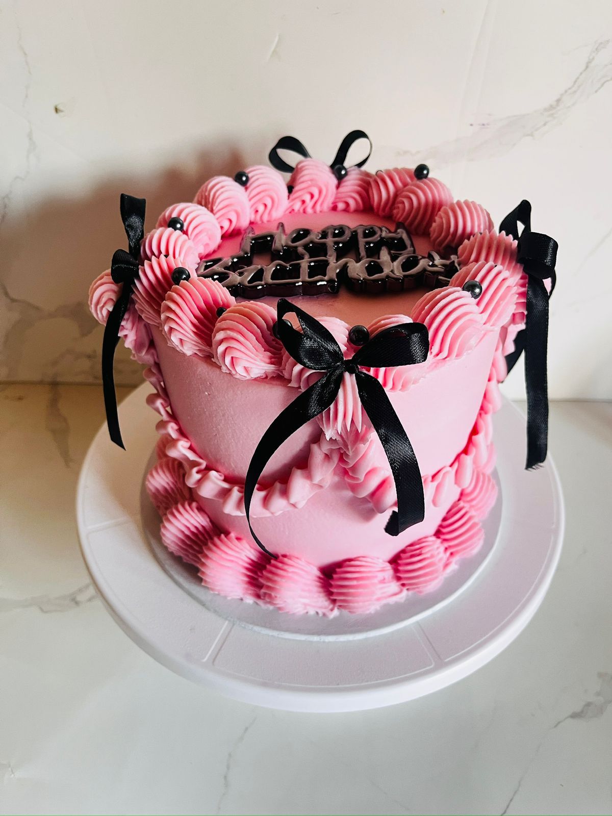 Pink Black Bow Cake by Baked by Buhlebenkosi