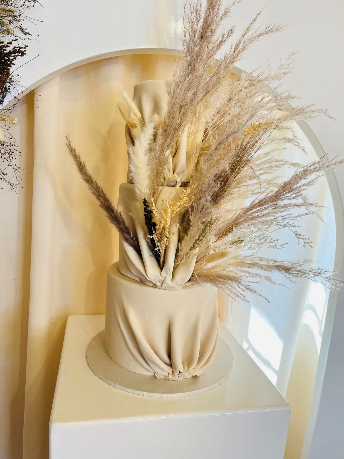Boho Pampas Draped Cake by Baked by Buhlebenkosi